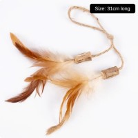 Іграшка з котячою м'ятою, дві палички на шнурочку, з пір'ям, 1 шт